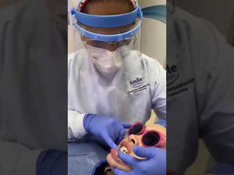 Caso Clínico: Tratamiento Odontológico para Dolor Molar y Pérdida de Inserción Dental