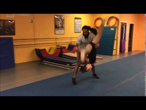 Allen Harris spotting an aerial at Leggz Dance Academy