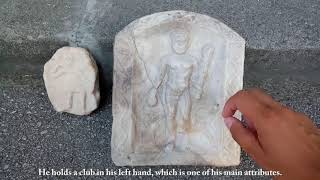 Two votive plates – one of Heracles and one of Artemis.
