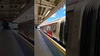 District line train at London underground of Upton Park |