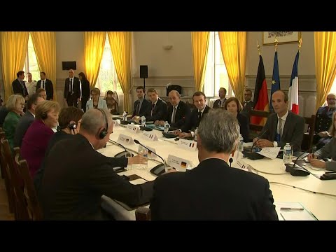 Macron, Merkel kick off Franco-German council on eve of European summit | AFP