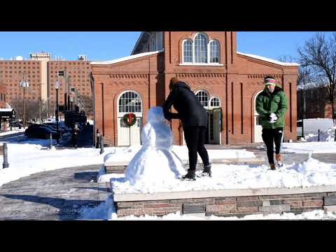 12-17-2020 Harrisburg, PA - People Enjoying the Fresh Snow on a Sunny Day
