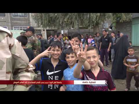 موكب جامعة اهل البيت ع للدعم اللوجستي اثناء تقديم الكتب و المساعدات الى جامعة الموصل 