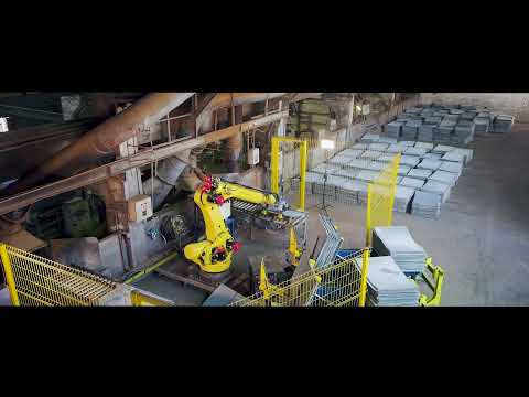 FANUC robot takes over heavy lifting and loading of two furnaces