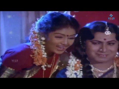Sridhar in a woman's get up in Bombat Hendti