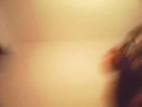 A kid who is playing basketball with a braclete