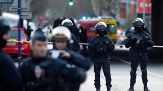 French prosecutors treating deadly stabbing outside Paris as terror attack