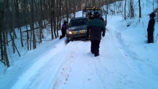 preview picture of video 'Getting the subaru out of a snow mobile trail'