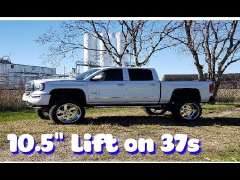 2016 Sierra on Mcgaughys 9" lift, 1.5" body lift, 37s, Illusion Blueberry Powder Coat, Zone Off Road
