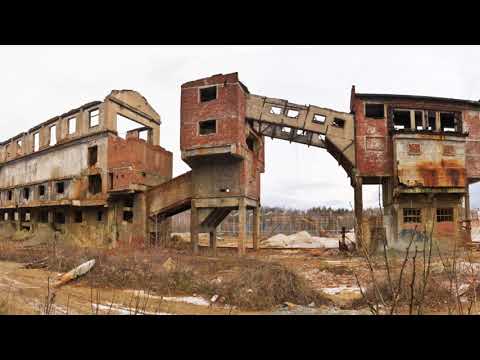 Abandoned buildings with dark Portal 2 soundtrack