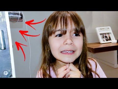 Arrancando o primeiro dentinho| Como tirar dente de leite em casa