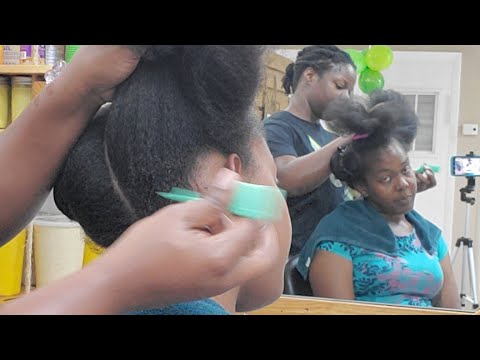 Cornrow protective style updo braids on natural hair