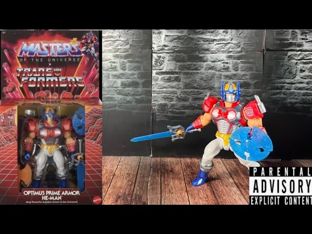 Vídeo relacionado con Masters of The Universe Origins y Transformers He-Man con Armadura de Optimus Prime, Figura de acción de 13,97cm, Juguete de colaboración articulado con Accesorios y minicómic, JGT18