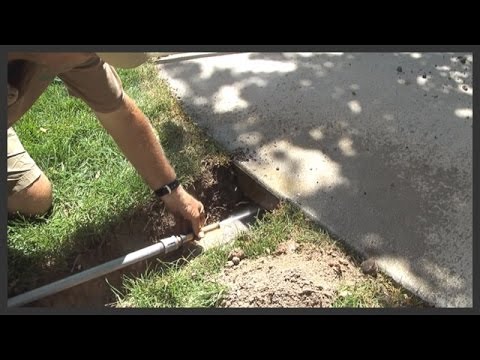 How to install a sprinkler pipe/conduit under a sidewalk