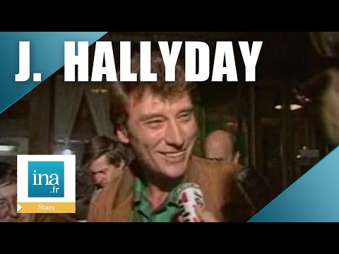 Johnny Hallyday annonce la naissance de Laura | Archive INA