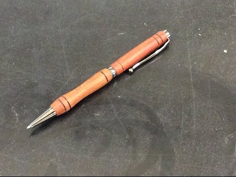 Turning a pen on the lathe.