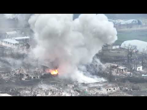 Two Thermobaric rockets from a Russian TOS-1A strike the Ukrainian village of Novoslovskoye