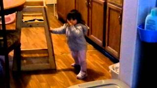 Sarah dances in the kitchen