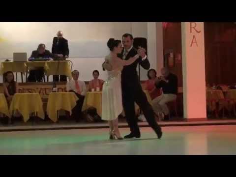  Anibal Lautaro  and  Valeria Maside  are  dancing  to  the  tango  "  Buscandote  "  by  Osvaldo Fresedo  at  Salonissimo Savona Tango Festival  in  2015