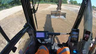 Volvo EC300EL Trimming Road To Formation Level...