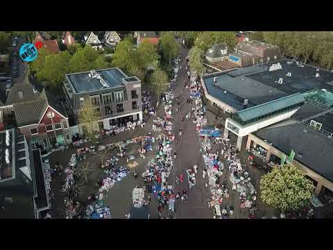 Drukte bij kleedjesmarkt rond winkelcentrum Het Loo in Heiloo (27 april 2026)