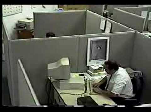 Office worker hits and kicks computer