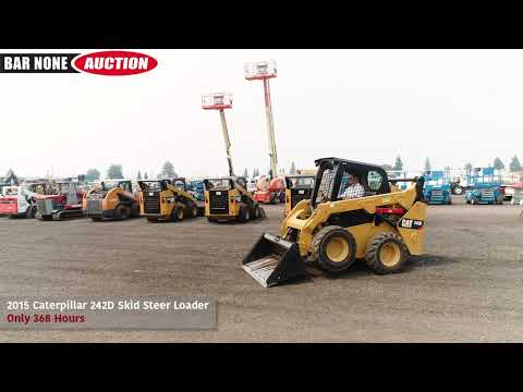 Мини погрузчик Caterpillar 242D презентация