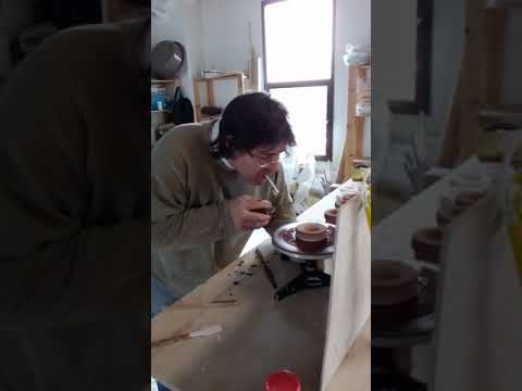 Rust blowing on ceramic.