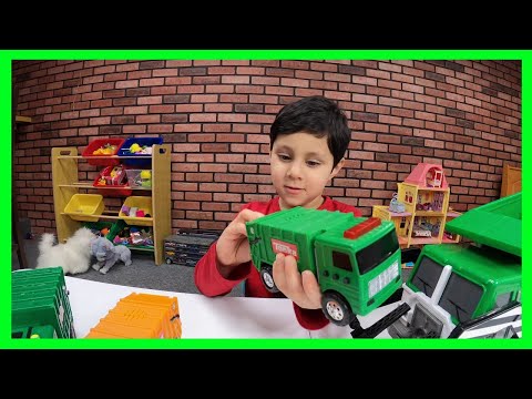 Wali Playing with Different Toy Garbage Trucks Video