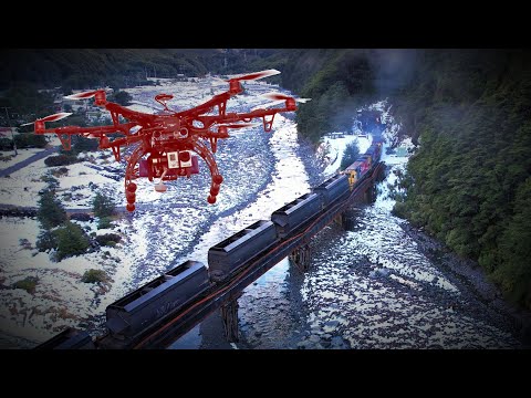 The most spectacular train in the snow by drone video - in 4K