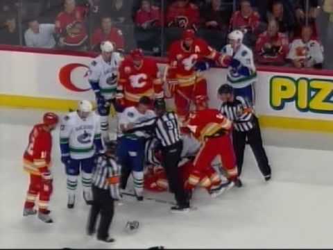 Dion Phaneuf hits Daniel Sedin 10/01/2009