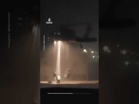 Israeli soldiers rappel from helicopter in occupied West Bank