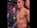 Tony Ferguson is embraced by Chuck Liddell as he leaves the cage at #UFC274