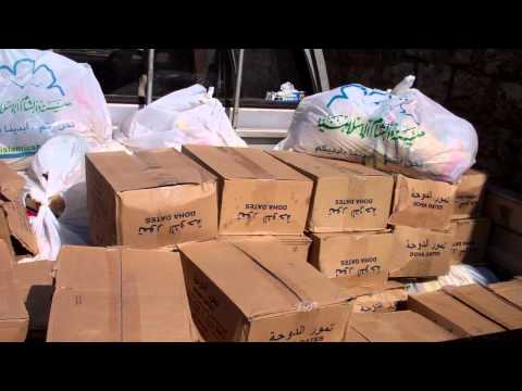 توزيع سلل إغاثية في البشيرية في محافظة إدلب من قبل هيئة الشام الإسلامية