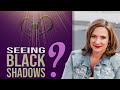What does it mean when I see movement or black shadows?