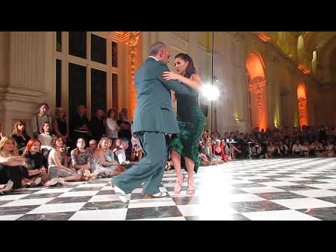  Horacio Godoy  and  Cecilia Berra  are  dancing  to  the  tango  "  A la luz del candil  "  by  Osvaldo Pugliese  at  Torino Tango Festival  in  2019
