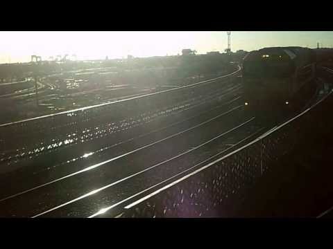 Overland train going over flyover North Melbourne