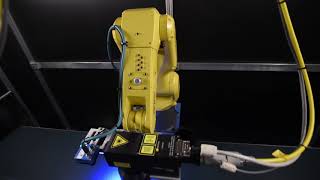 Robotic Fixtureless Laser Marking System - Triton Automation Group