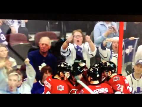 Old lady leafs fan flipping off Senators goal celebration