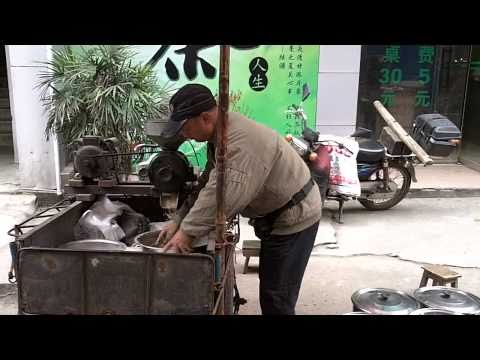 Grinding in a Leshan Street Market