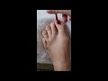 Painting The Toe Nails Red