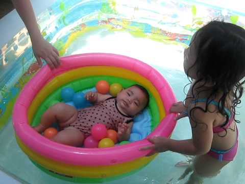 Mitsy & Misha in their swimming pool
