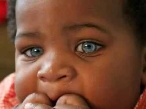 Wonderful black baby with blue eyes.