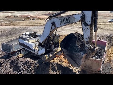 Caterpillar 375 Excavator Loading Mercedes & MAN Trucks