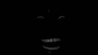 Negro riéndose enla oscuridad video ;v