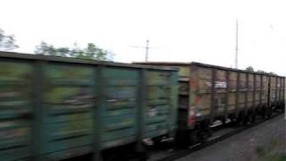 preview picture of video 'Train #418 Moscow-Anapa overtakes freight train beside Lihaja station.'