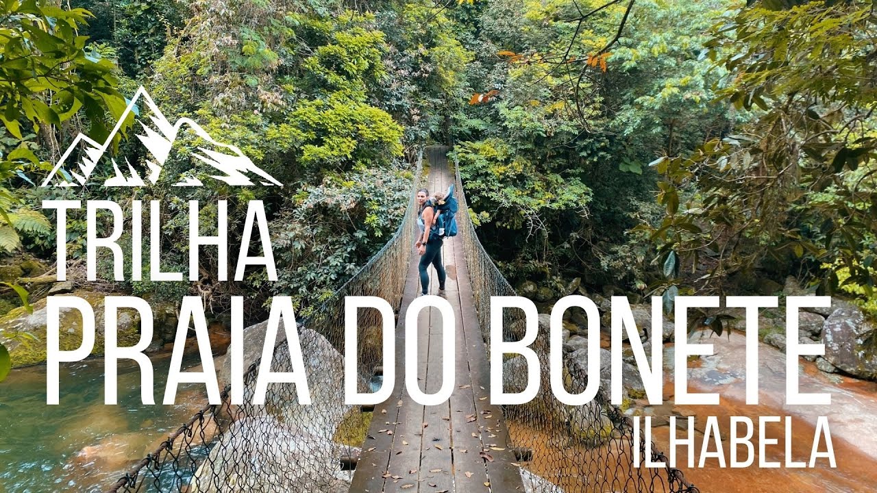 Trail to Praia do Bonete, Ilhabela. I forgot the trekking poles and Gabi ran into the waterfall!