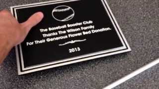 Review of silver and black cast aluminum plaque with stake