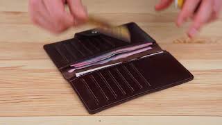 Гаманець вертикальний зі шкіри алькор на кнопках SHVIGEL 16171 коричневий