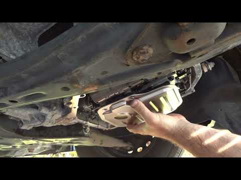 cómo cambiar el fluido de transmisión en un Toyota Corolla 2009 2006-2013